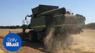 Warm weather makes early work for harvesters across Britain