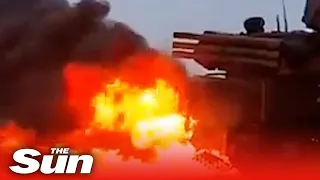 Ukrainians take Russian TANK for joyride & burn £11m missile launcher as resistance holds strong