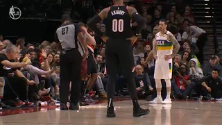 Referee knocks over a tray of drinks early in the 2nd quarter of the Pelicans/Blazers game