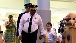 Chicago cops stand with fallen officer's son at kindergarten graduation