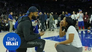 Fan turns layup game into surprise proposal at 76ers game - Daily Mail