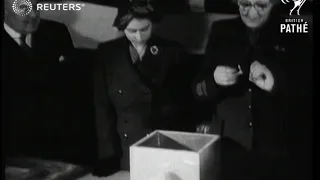 Princess Elizabeth helps in ballot for cot blankets (1949)