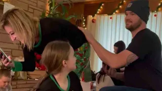 Man catches partner of 6 years off-guard with a romantic Christmas Proposal