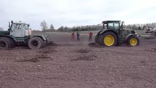 T-150k vs. JOHN DEERE