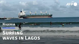 Nigerian surfers compete in Lagos' Tarkwa Bay | AFP