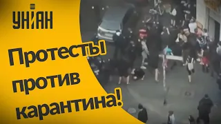 Берлинский митинг против карантина с флагами России