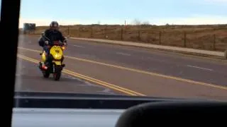 Drunk guy on scooter 01