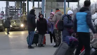 Ukrainian refugees fleeing Russian troops arrive at Romanian border