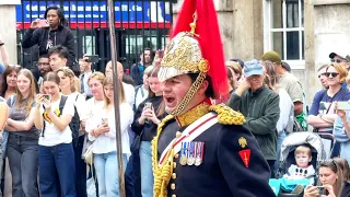 Captain Inspects the Guards at 4 O'Clock Parade  with the Trumpeter