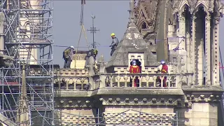 Firefighters salvaging remnants of Notre Dame