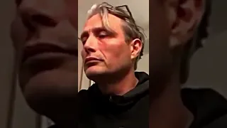 Mads Mikkelsen smoking