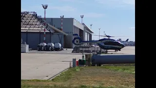 Police helicopter flies a 360° turn before takeoff at DUS Airport. | Reg: D-HNWT | Airbus H145 |