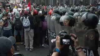 Clashes at anti-government protests in Peru