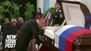 Putin weeps over friend’s coffin | New York Post