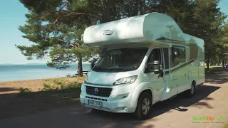 Motorhome wilderness camping at beautiful lake in north of Sweden with SkandiTrip
