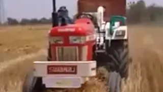 Sawraj 963 with straw reper without driver