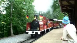 Red Train coming into tweedside station Busch Gardens Williamsburg Va.