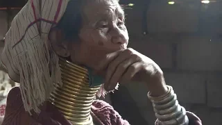 Young Kayan women shun traditional bronze neck rings