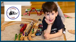 Play with toy trains and build a brio train track