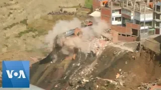 Bolivia Landslide Sweeps Houses Away