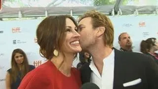 Julia Gets a Surprise Kiss from Ewan McGregor