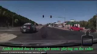 Idiot runs red light in front of cop