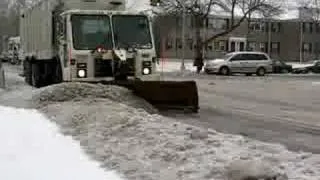 NYC Sanitation Department truck plowing snow