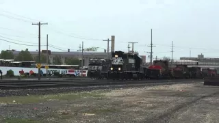 NS hi hood GP38-2 pulls hot metal train