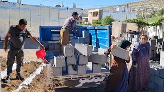 Buying blocks from the factory by Amir and watering the seedlings by Sadeq