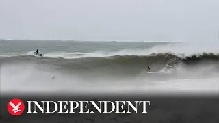 New Zealand surfers ride large waves during Cyclone GabrielleReply