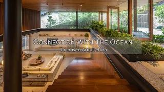 Exploring An Oceanfront House Design From Steel, Stone, and Wood Seamless Connection with The Sea