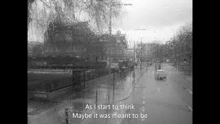 Walking in the rain ( lyrics only )