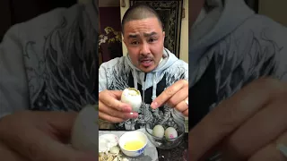 Eating Balut (Duck Embryo)