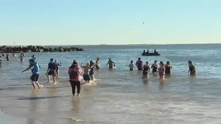 Thousands hit the beach for Coney Island Polar Bear plunge