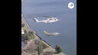 US Marines CH-53K Helicopter lifts F-35C Fighter jet