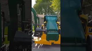 Waste Management Garbage Truck Grabs Dishwasher with Claw