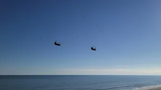 Twin Chinook helicopters low altitude fly over Myrtle Beach
