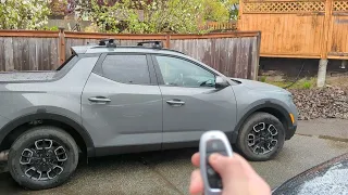 2022 Santa Cruz front windows roll down randomly - actually via the key fob