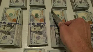 300,000 USD in cash.