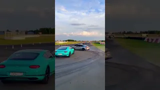 BMW M8 drifting through other powerful cars smoothly.