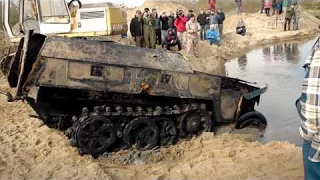 Pulling the WWII Tanks and Armored Troop-Carriers Out of the Swamp