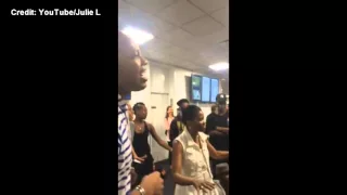 Cast of Lion King, Aladdin sing for stranded commuters at NYC airport