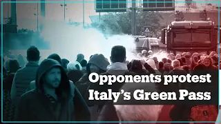 Anti-vaccination activists are dispersed by police during a protest against Italy’s Green Pass