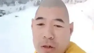 Chinese egg man singing in snow