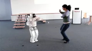 Honda Asimo dancing with girl