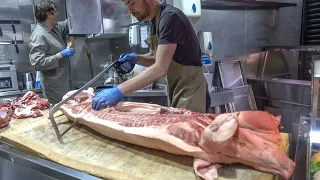 Chopping and Cutting Pigs, Lambs and More Meat. London Butchers in the Street Market