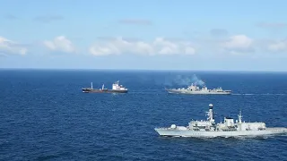 RUSSIANS SHADOWED BY BRITISH WARSHIPS