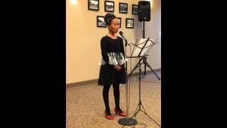 7 year old India singing oh holy night. Amazing!