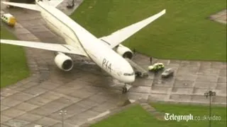 Armed police arrest two aboard plane at Stansted airport