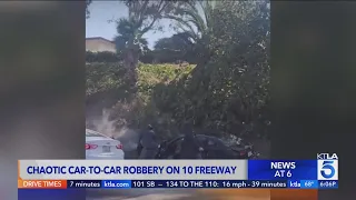 Chaotic car-to-car robbery on 10 Freeway caught on video